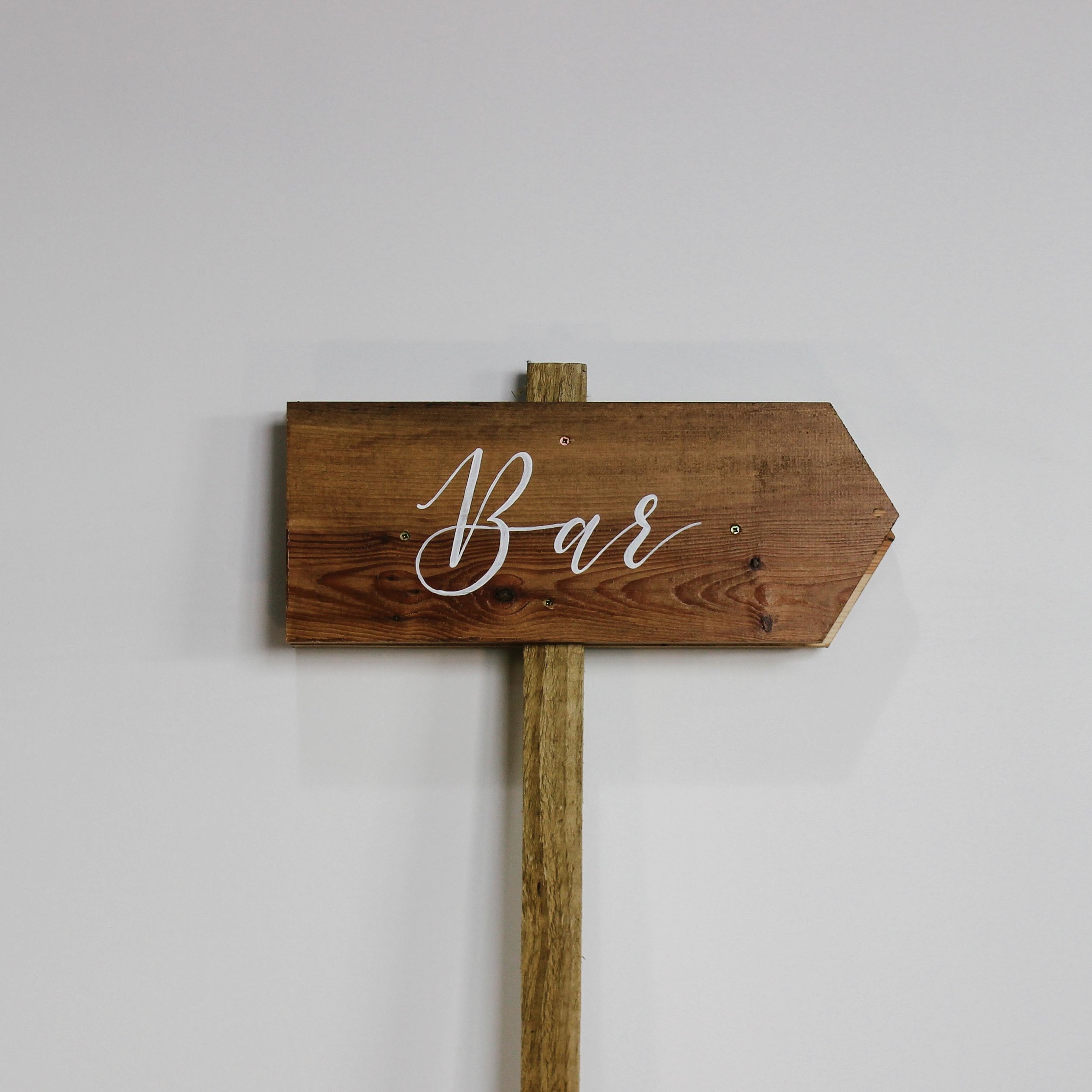 ‘bar’ wooden arrow sign