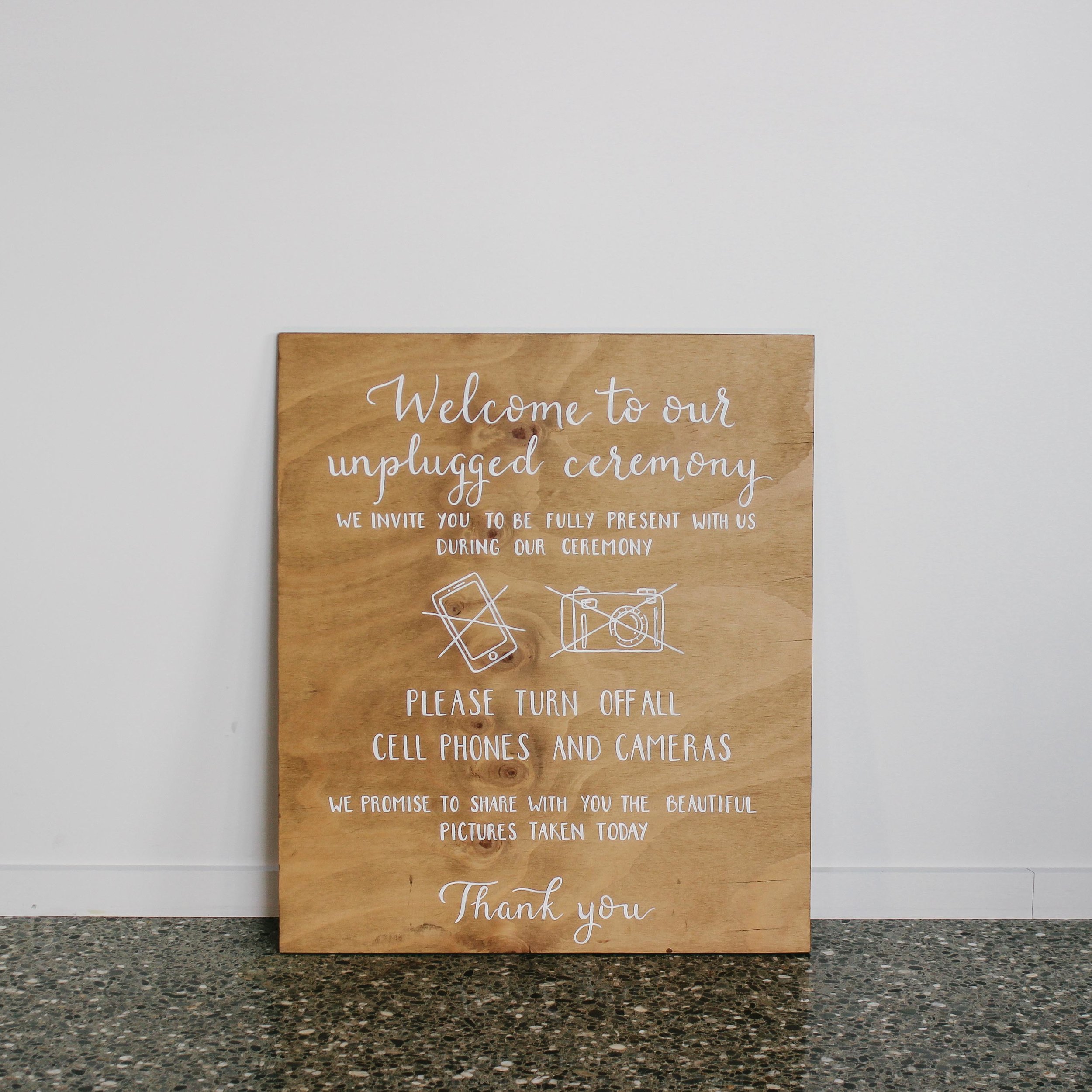 Unplugged Wooden Sign
